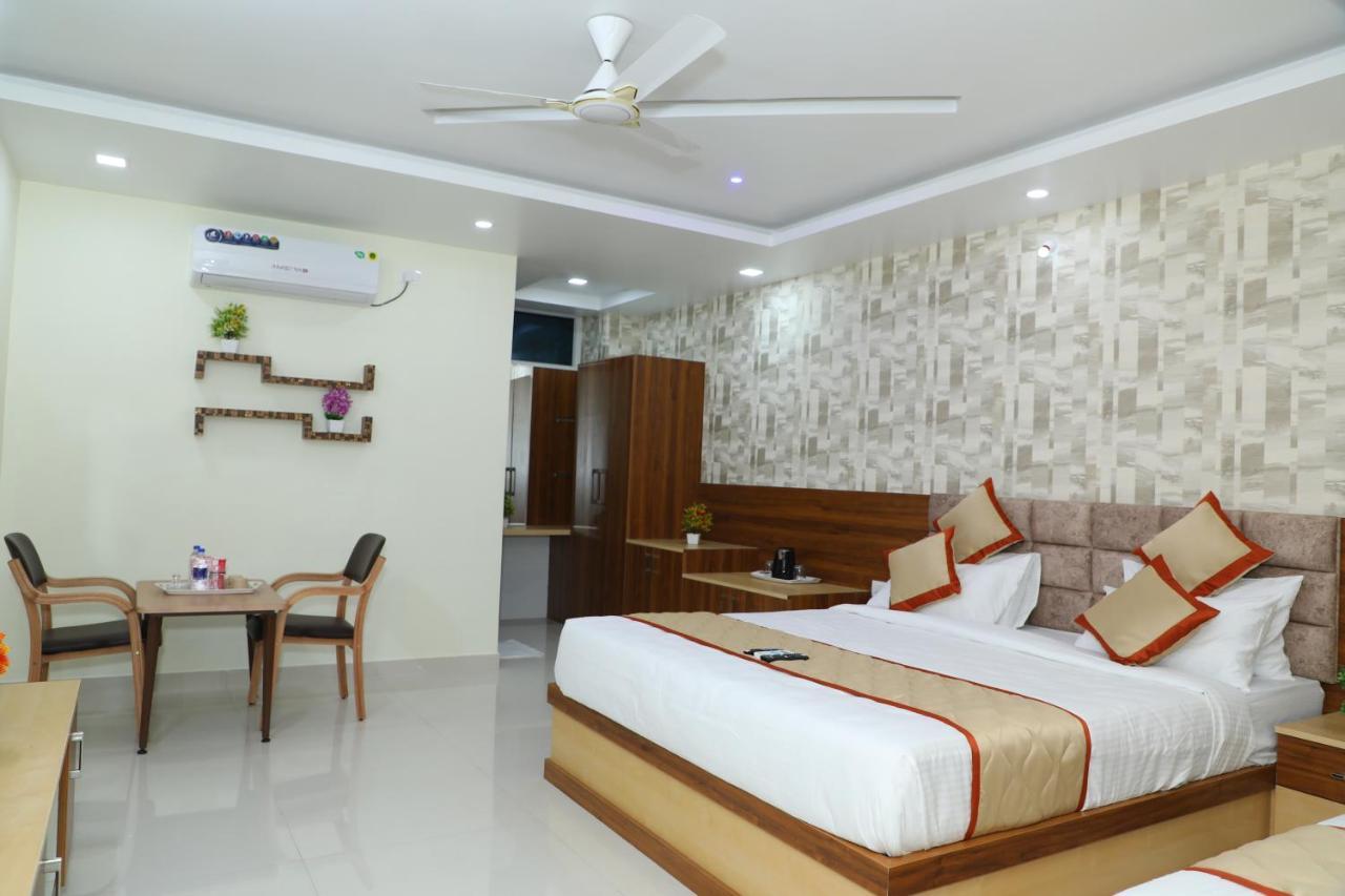 Hotel 8Th Mile Suites Bangalore Exterior foto