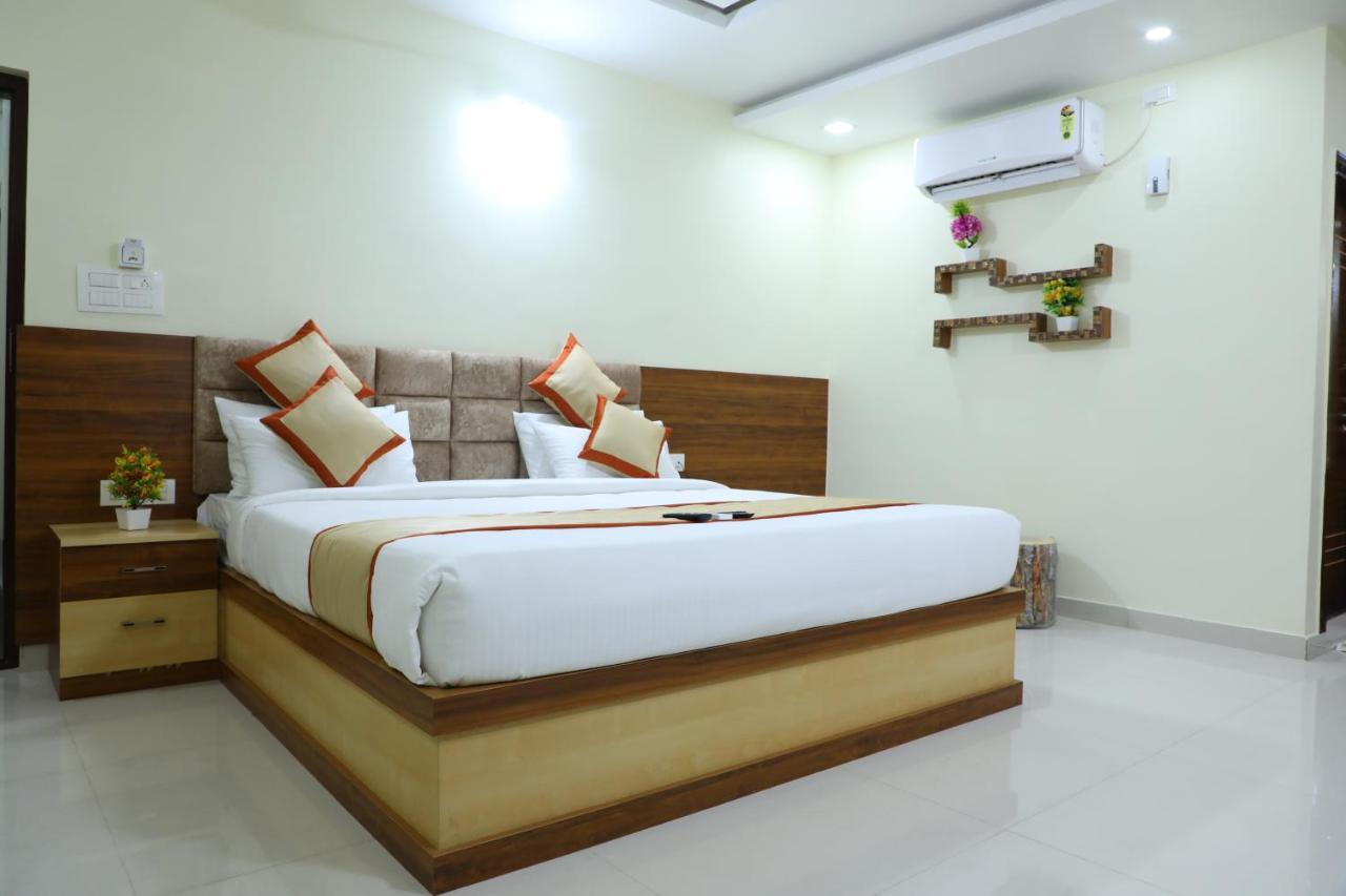 Hotel 8Th Mile Suites Bangalore Exterior foto